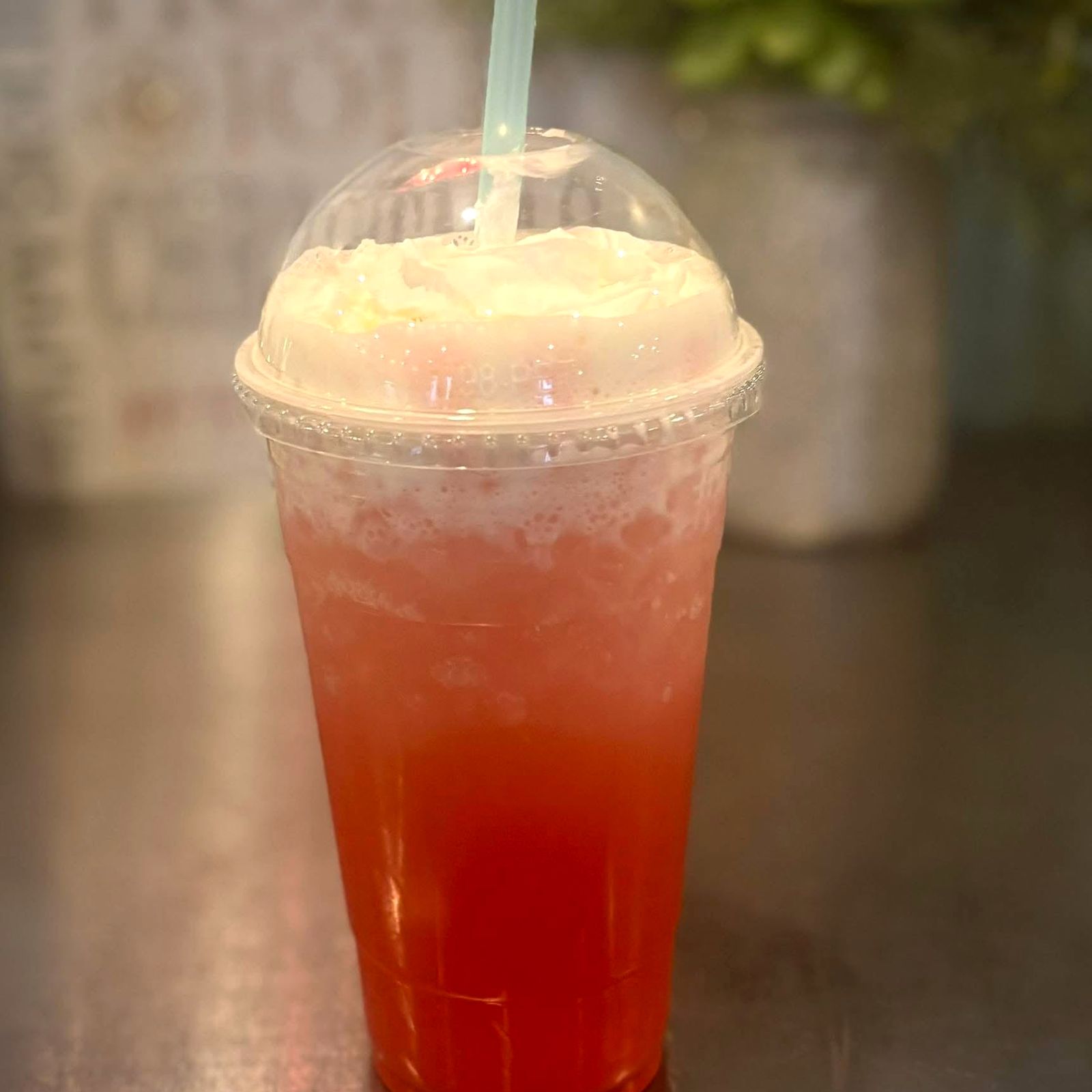 Iced dirty soda with whipped cream
