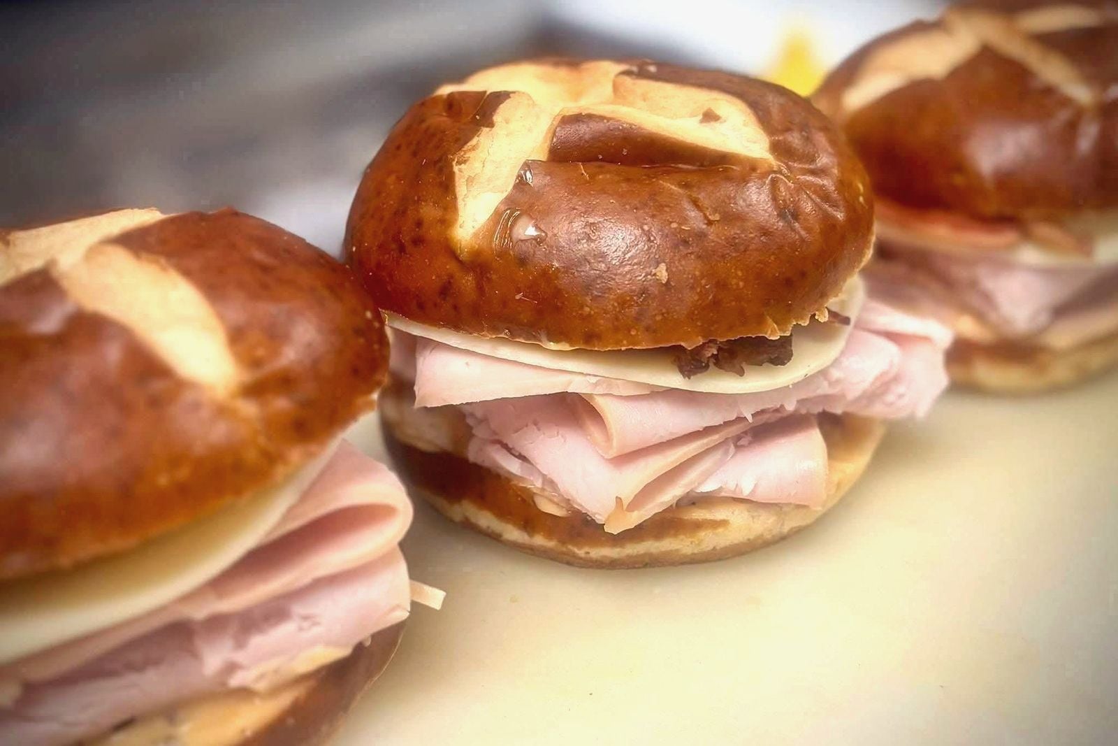 Sandwiches on pretzel buns